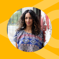 A yellow graphic with a woman with long black hair